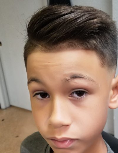 young man's hair cut